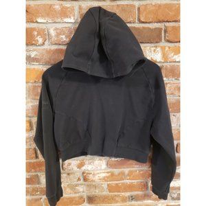 Alphalete Athletics basic black cropped pullover hoodie.